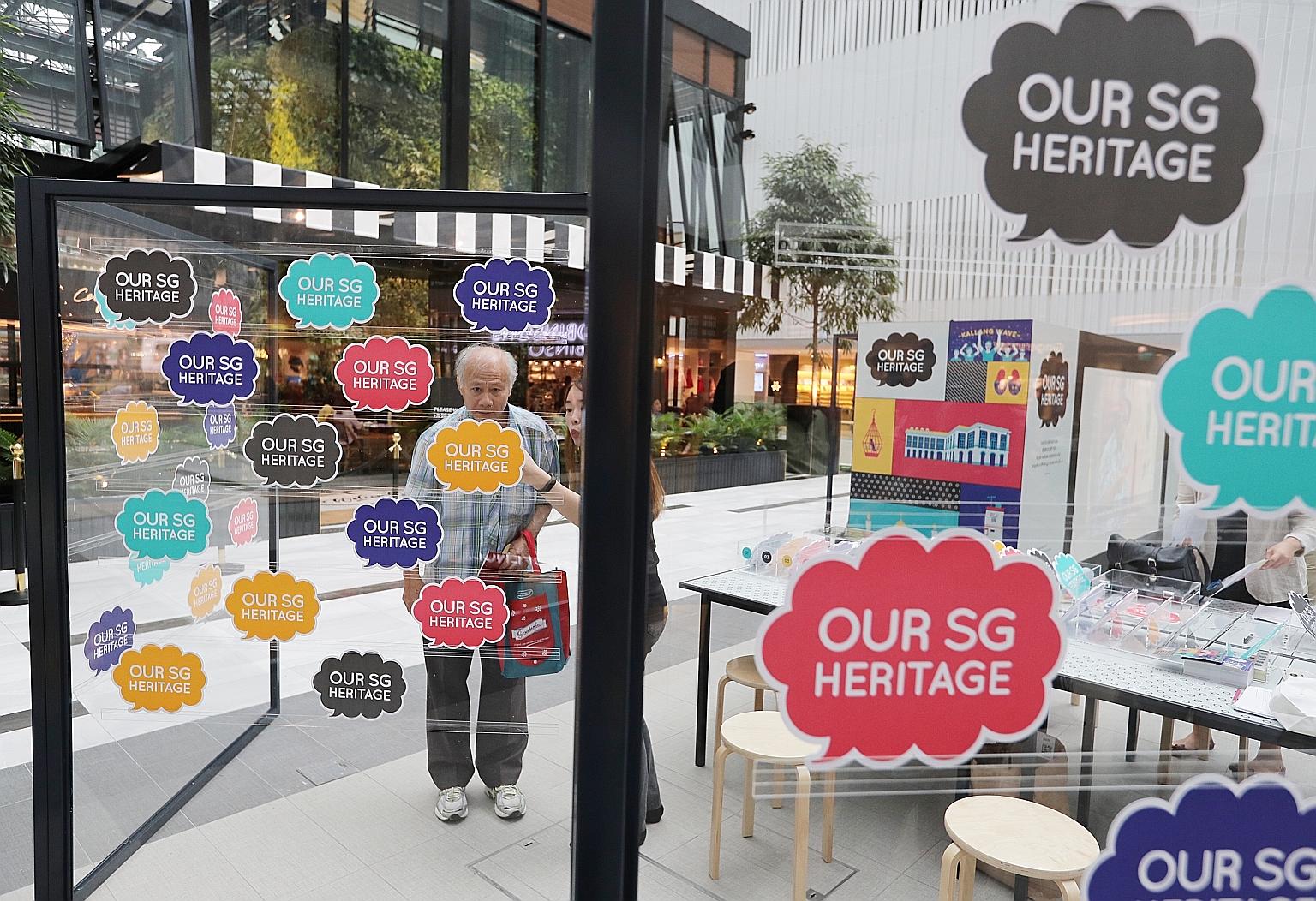 At the travelling roadshow at Raffles City Shopping Centre, visitors can learn about Singapore's first national heritage plan and give feedback.