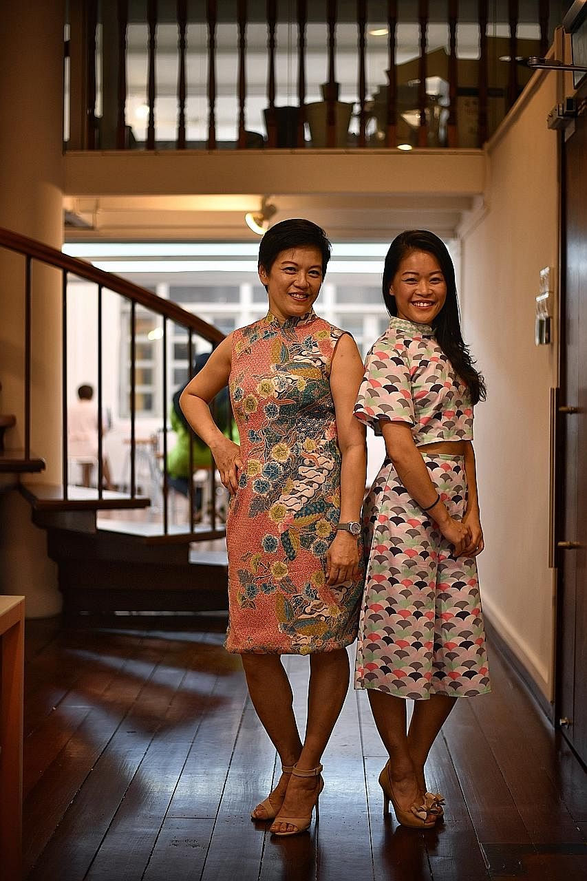 Ms Linda Ng and her daughter, Ms Lorencia Kan, wearing cheongsam that Ms Ng made. Fashion Makerspace, founded by (from left) Ms Hailey Lim, Ms Shareen Lim and Mr Ken Low, offers classes from basic sewing to pattern making.