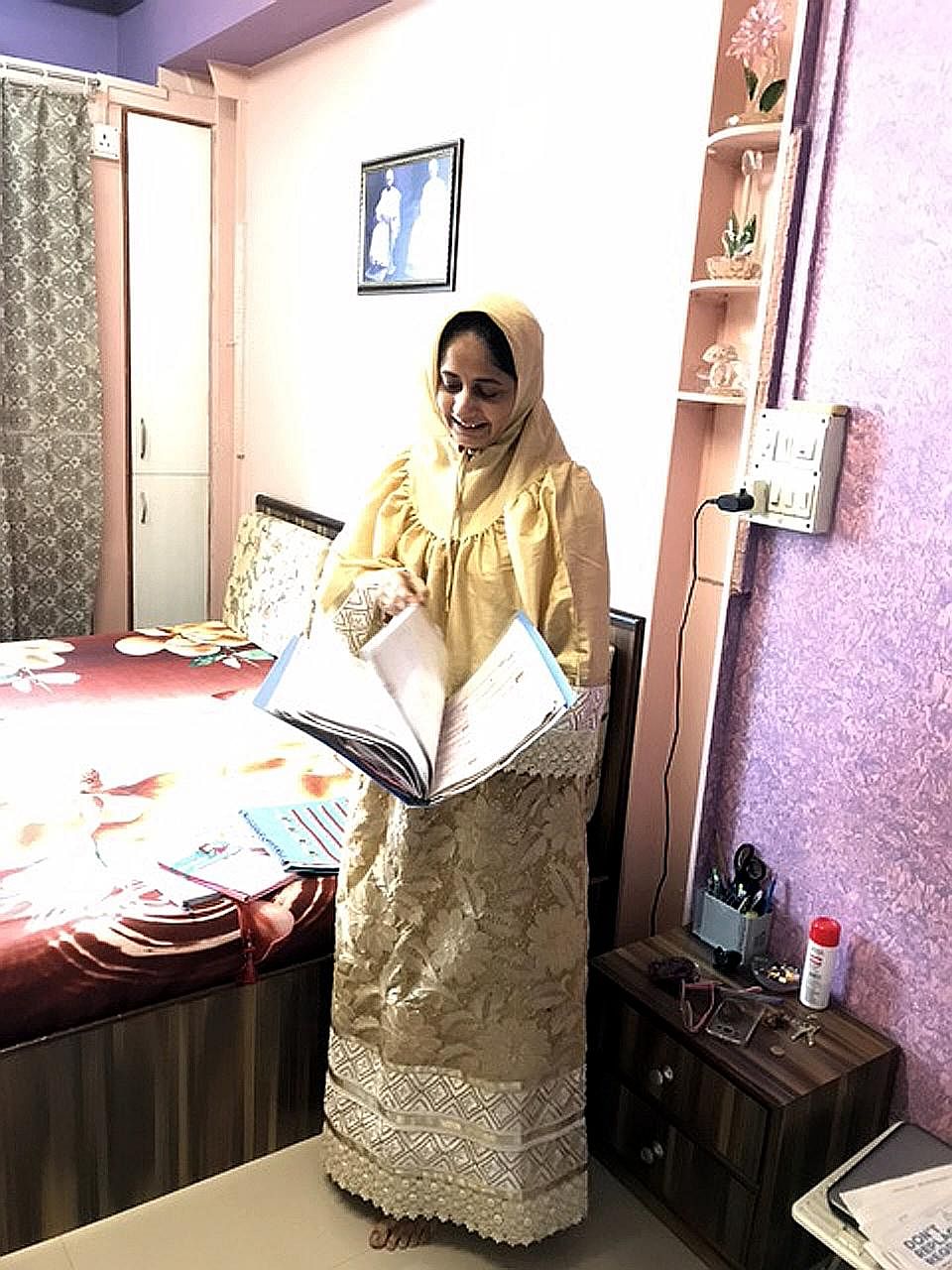 Mrs Marya Shabbir Jasdonwala in her room at the apartment complex in Anjeerwadi, which serves as temporary accommodation for families displaced by the redevelopment of Bhendi Bazaar.