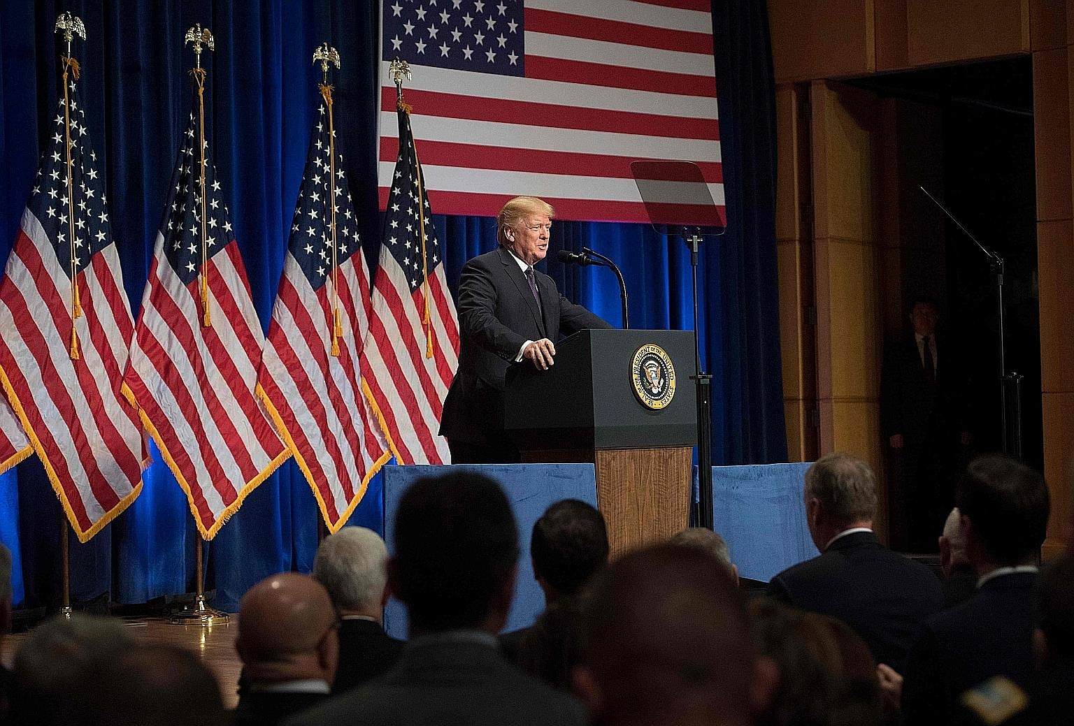 US President Donald Trump speaking on his administration's National Security Strategy (NSS) in Washington last month. The National Defence Strategy, which builds on the NSS, states that the US is "emerging from a period of strategic atrophy, aware th