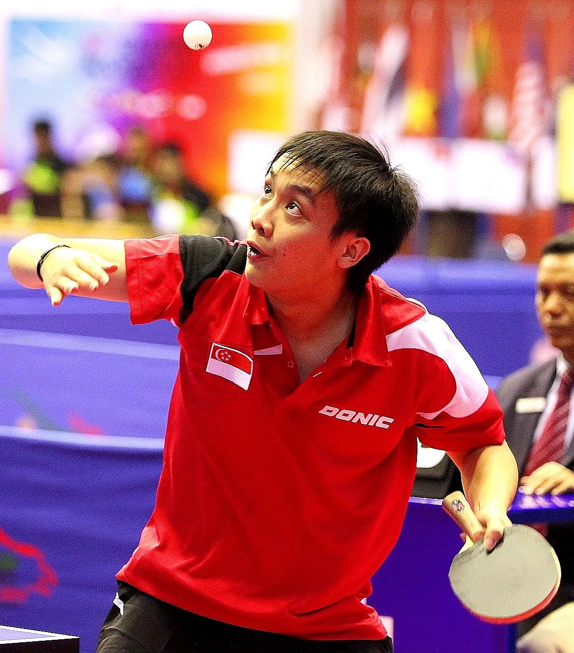 Singapore table tennis player Pang Xuejie hopes to win at least one gold medal and expects India, England and Nigeria to be the Republic's main rivals in the men's team competition.