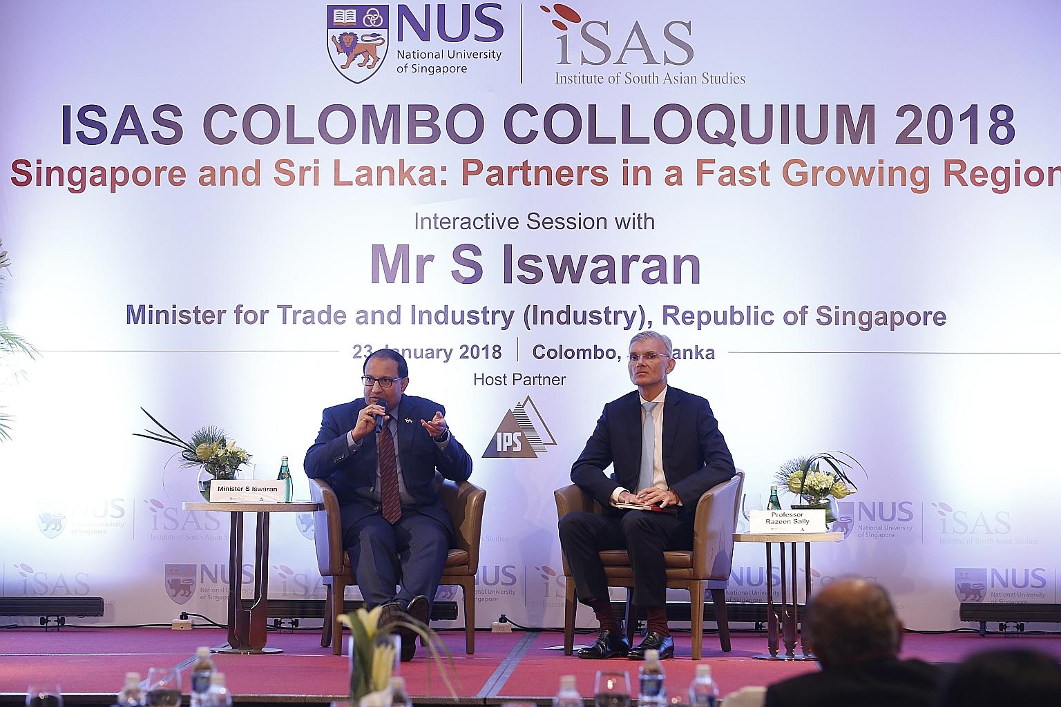 Minister for Trade and Industry (Industry) S. Iswaran speaking at the ISAS Colombo Colloquium 2018, with moderator Razeen Sally, chairman of the Institute of Policy Studies of Sri Lanka and senior adviser to the Sri Lankan Finance Ministry.