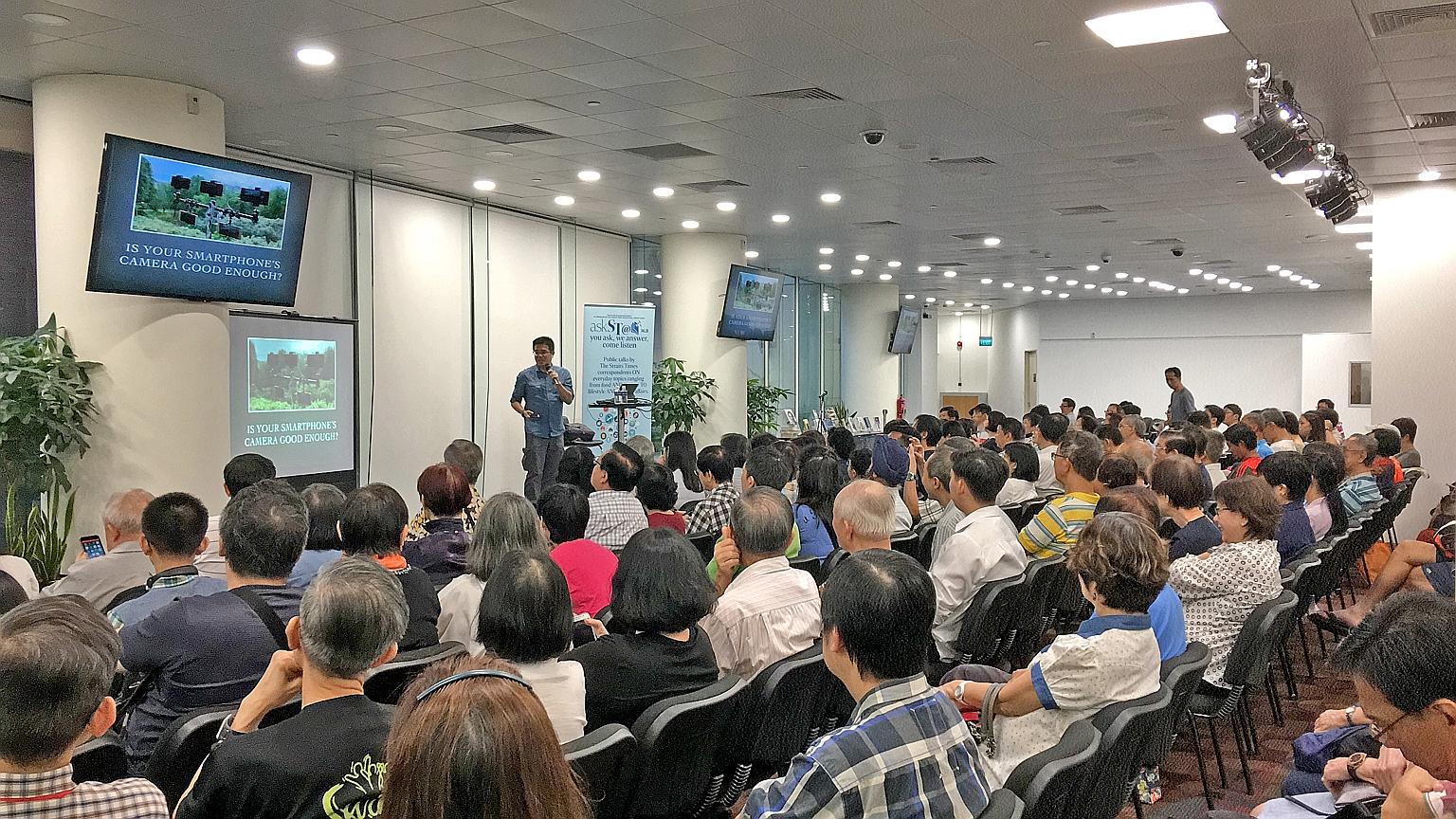 The Straits Times deputy tech editor Trevor Tan's talk at the National Library at Victoria Street was attended by around 200 people, many curious to know his opinion on which camera was a good one.