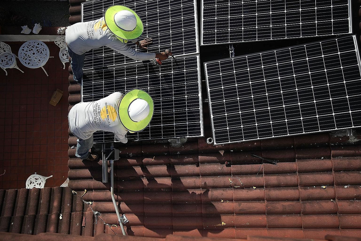 Solar panels being installed on the roof of a home in Florida. The United States has recently taken several trade actions against China, including steep import tariffs on solar products.