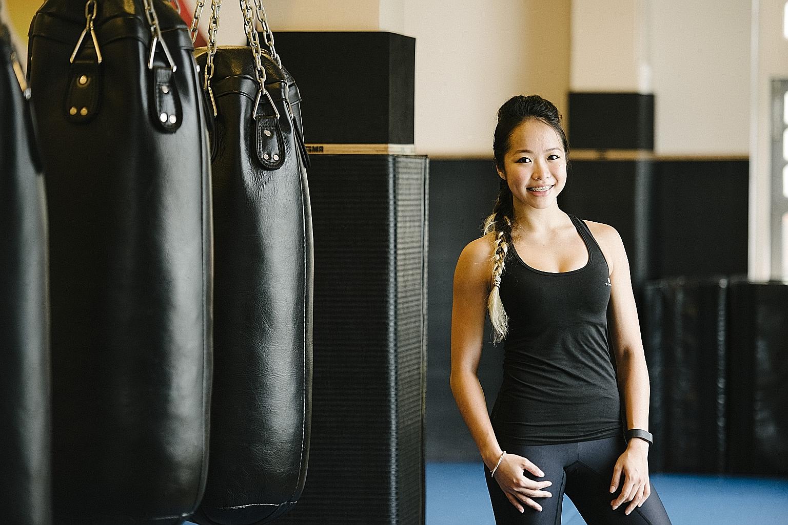 Ms Cheryl Loh likes her smile but thinks that she smiles too much during class, thus failing to portray the stern image of a coach.