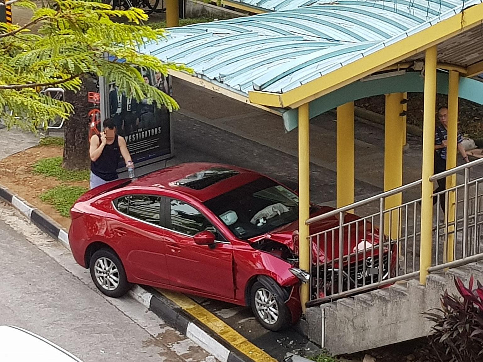 The red Mazda mounted the pavement and came to a stop at the foot of the overhead bridge in Jurong East Central last Friday. The 61-year-old driver was taken to hospital with minor injuries.