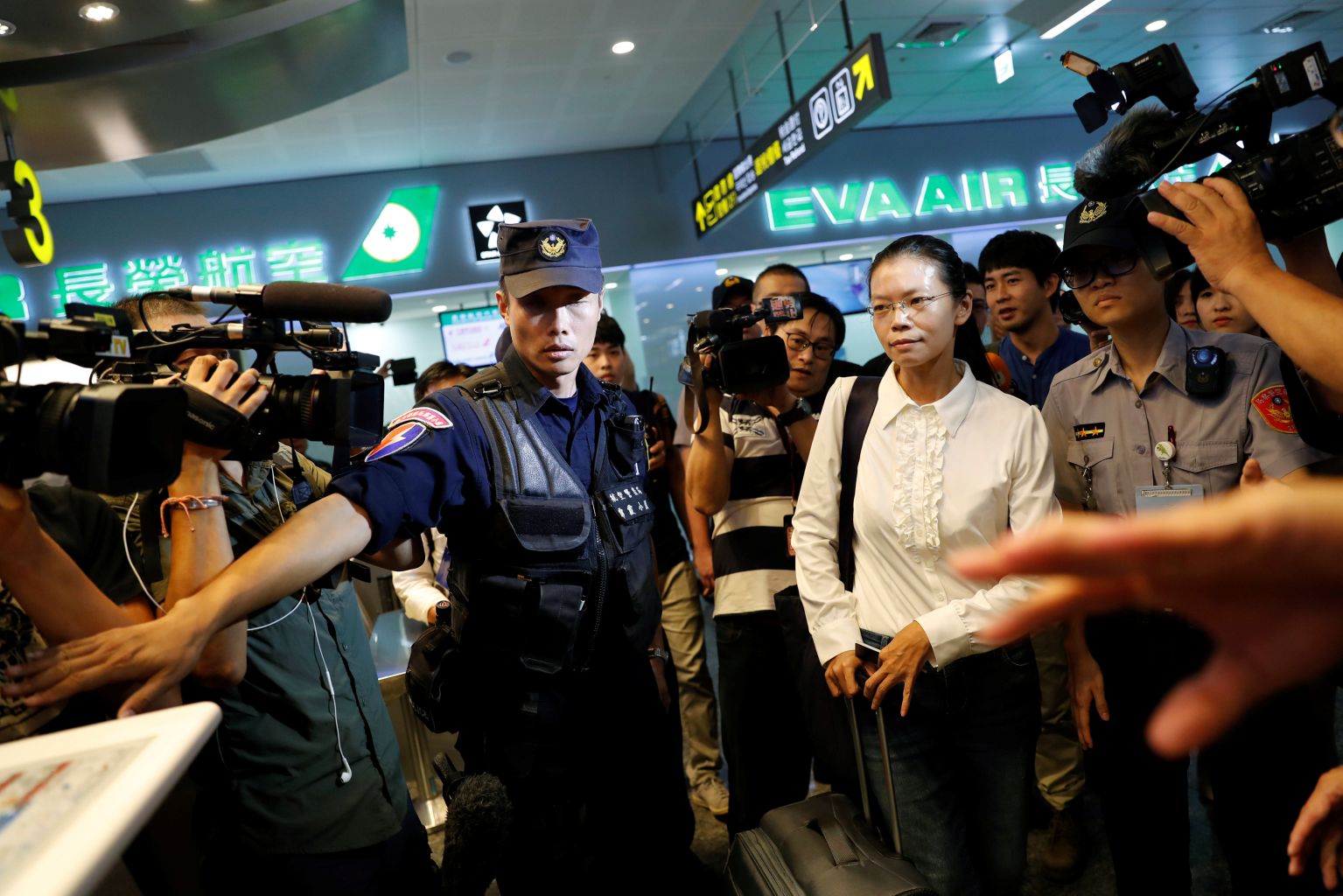 Shell Li Ching Yu Wife of Taiwan activist jailed in China stopped from flying to visit ...