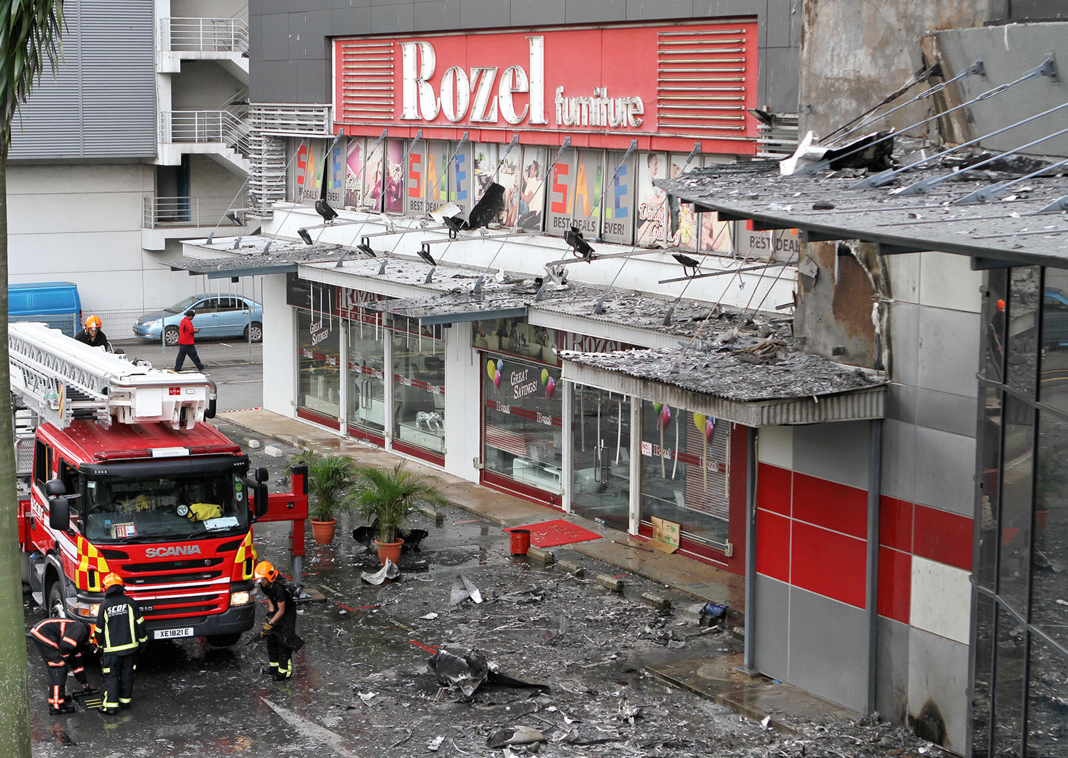 Firefighters evacuated about 50 people from the Cambridge Industrial Trust building at 30, Toh Guan Road, after a fire broke out in the building in May last year. The fire reportedly spread across multiple floors via the building's external cladding,