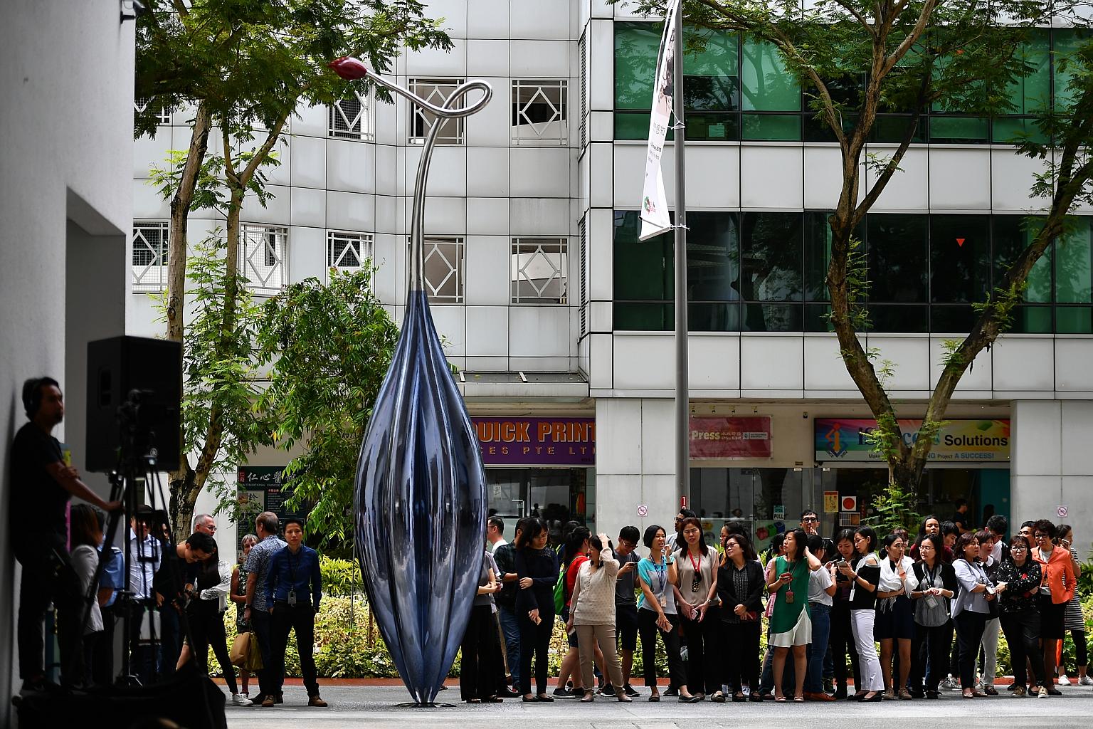 A sculpture titled Seed, by Nafa alumna Han Sai Por, was unveiled yesterday by Minister for Education (Higher Education and Skills) Ong Ye Kung, who also officially opened the arts academy's Campus 1 Tower Block.