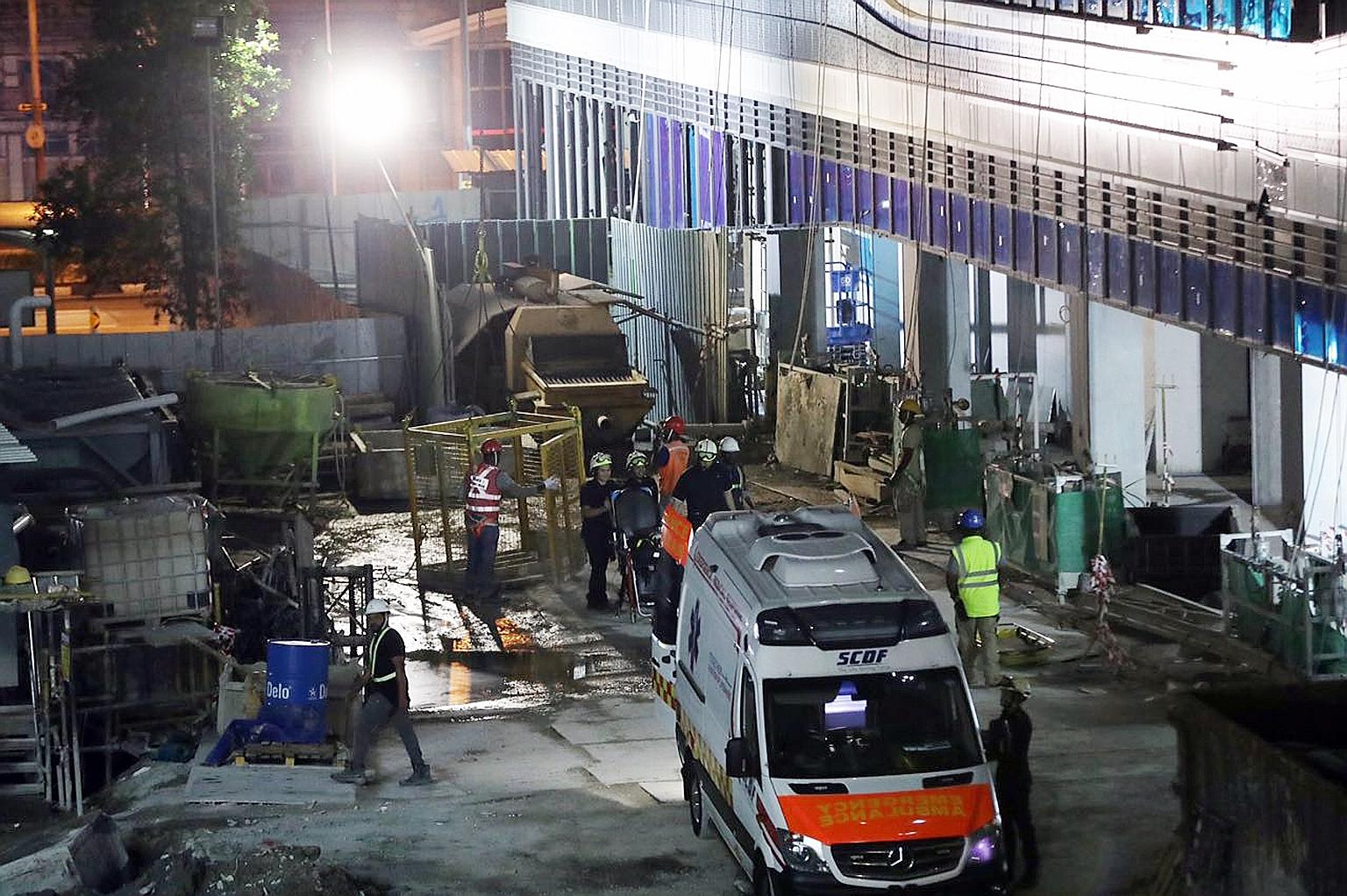 Singapore Civil Defence Force personnel at a Jalan Sultan worksite on Feb 5 following an accident in which a 41-year-old construction worker died after his neck was pierced by a reinforcing bar. Last year's drop in workplace deaths brings the fatalit