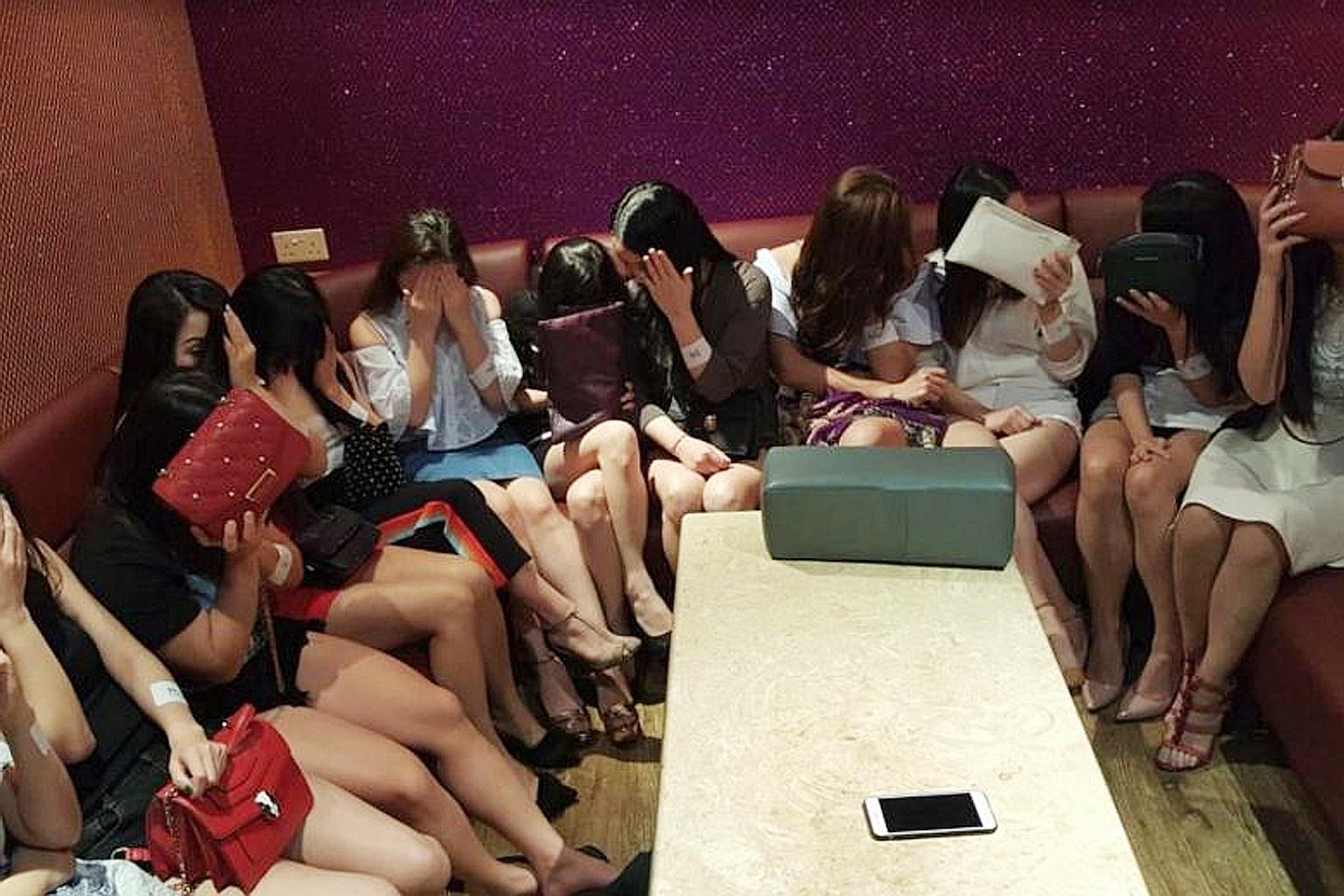 Some of the women who were arrested for working without a licence at a public entertainment outlet. The police said that action will also be taken against the outlet's operator for contravening licensing conditions.