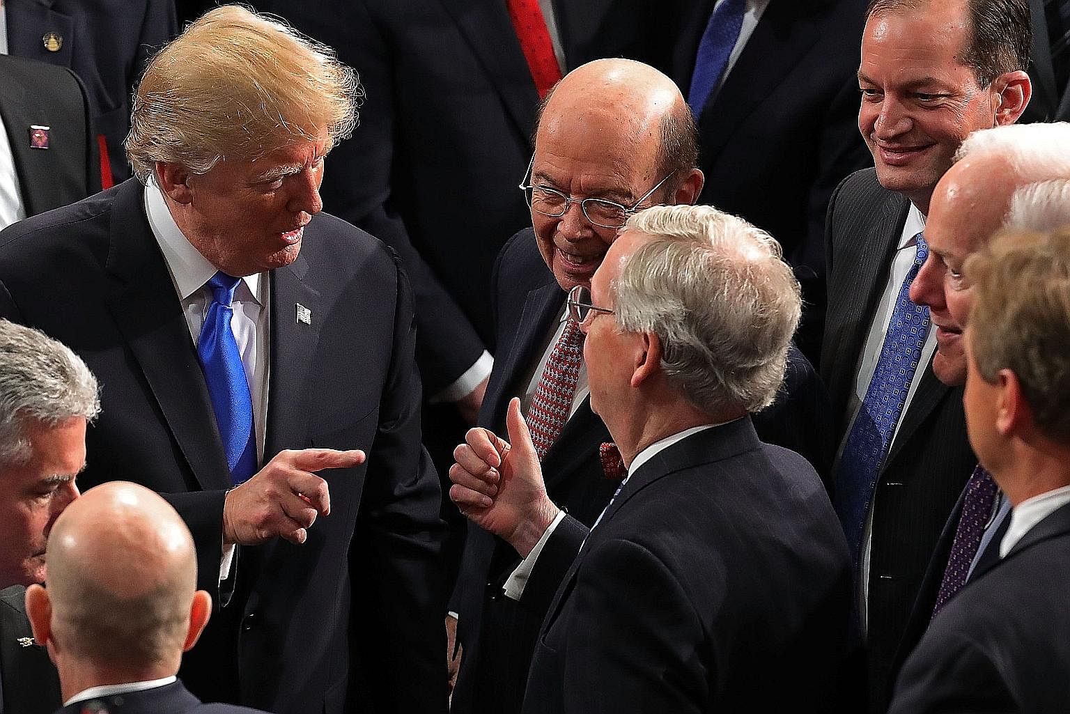 US President Donald Trump with top Republicans following his State of the Union address last month. Voices from within the party have been warning him against following through on his tough talk on trade with China.