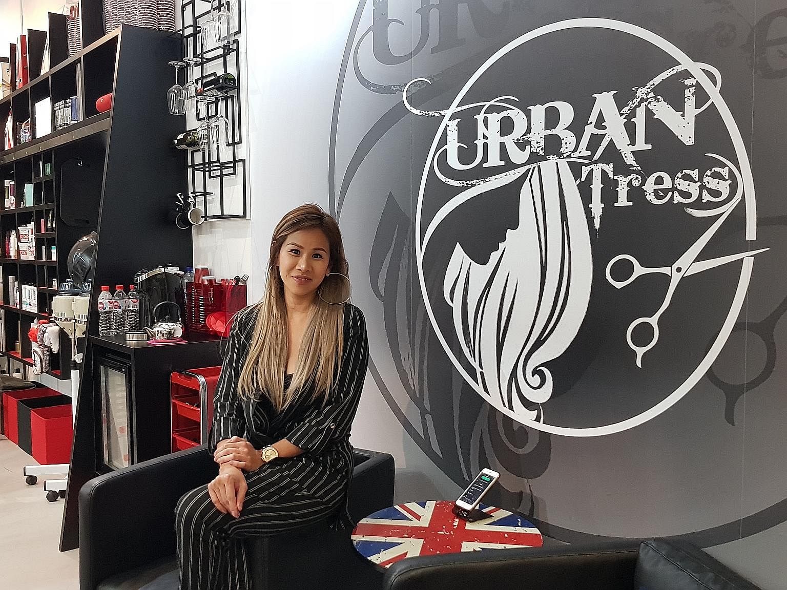 Tresses Studio's Mr Kenny Chew signed up for a hair-salon accreditation scheme. Mrs Jeanie McLean, who runs her own salon, says once she proves her skills to her clients, they trust her. Mi the Salon's founder Gary Chew personally cuts and dyes his c