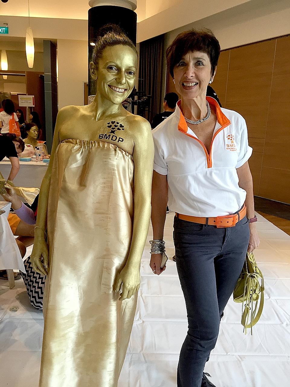 Ms Jane Prior with a Bone Marrow Donor Programme volunteer wearing body paint to turn herself into a human statue during a campaign on World Marrow Donor Day in 2016. Ms Prior announced in a Facebook post on Jan 29 that she is stepping down as chief 