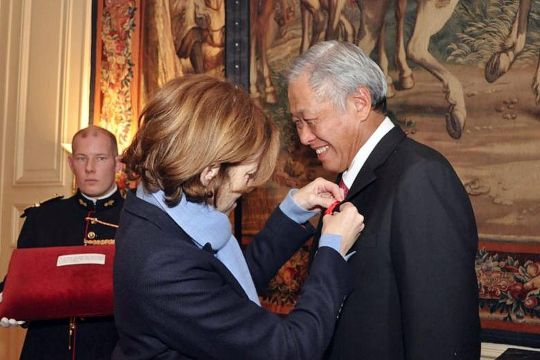 French Defence Minister Florence Parly presenting the Legion of Honour award to Dr Ng in Paris on Monday.