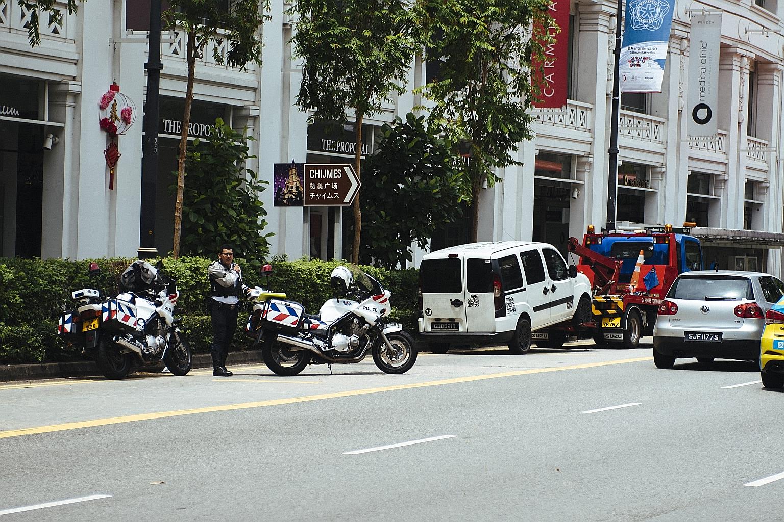The man's van, parked near Capitol Piazza yesterday, was towed away at around 12.30pm. Suspected drug-related paraphernalia were seized from the vehicle.