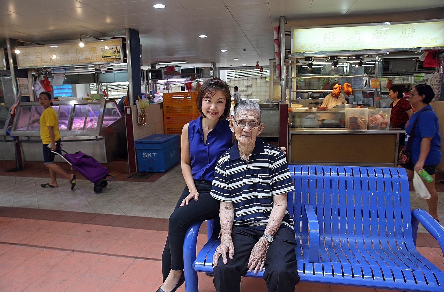 Ms Sandra Leong with her grandfather, Mr Chua Pee Tong. He enjoys going to the market but can do so only if he is accompanied, lest he falls. Ms Leong's idea was to have stalls form the inner core of hawker centres and wet markets and have an outer r