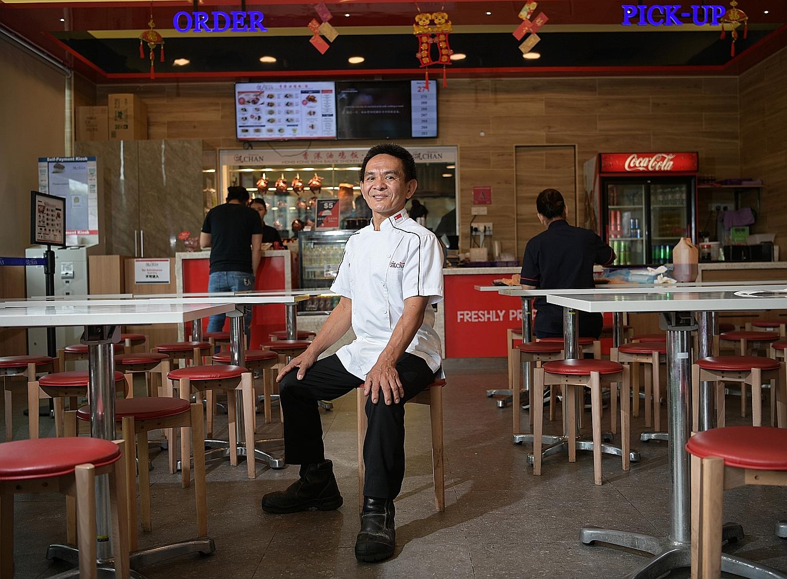 Mr Chan Hon Meng in his Hawker Chan outlet in 18 Tai Seng, after the peak-hour lunch period. Soon after his Chinatown hawker stall got a Michelin star, he partnered Hersing Culinary to expand his business.