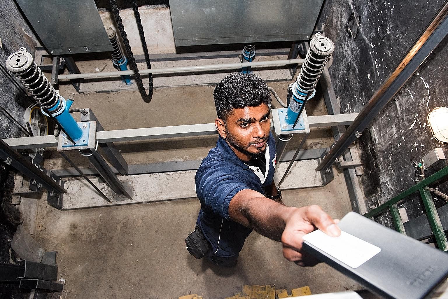 Chevalier lift technician Vinod Balakrishnan was once directed to the wrong lift and wasted an hour. Lift technicians are the only ones qualified to enter the lift pit and have to deal with whatever dead or alive animal they find there.