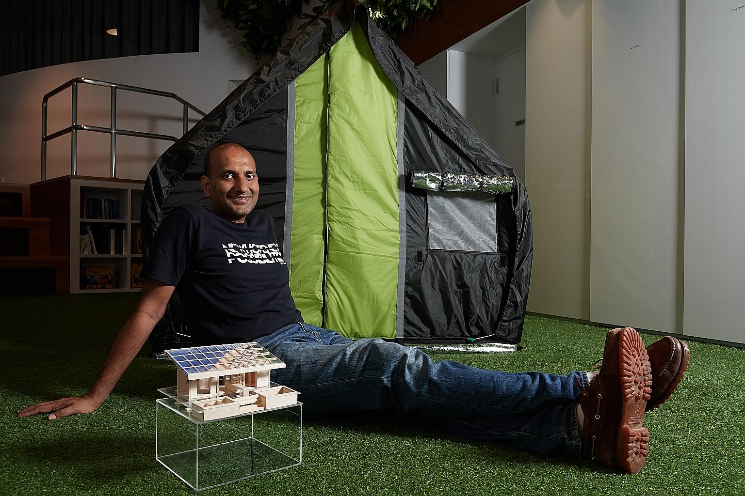 Mr Prasoon on a visit to Diggi Tanda village in India. billionBricks has worked on about eight projects and settled at least 4,000 homeless in several countries. Mr Prasoon Kumar at his office in Fusionopolis, with the all-season weatherHYDE tent tha