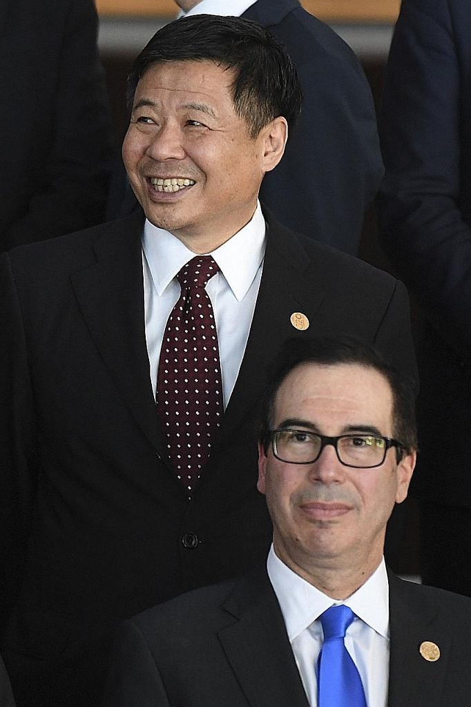 China's Vice-Finance Minister Zhu Guangyao and US Treasury Secretary Steven Mnuchin at the G-20 meeting in Buenos Aires, Argentina, on Monday.