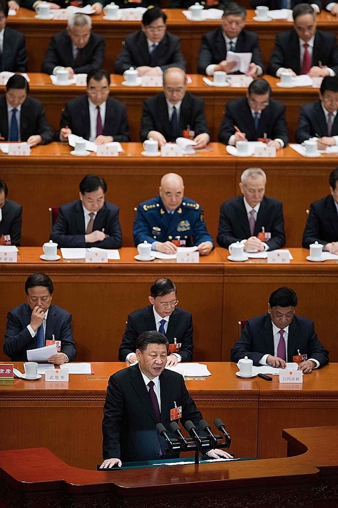 Chinese President Xi Jinping at the close of the annual National People's Congress yesterday. Among other things, he said China will "continue to actively participate in the reform and construction of global governance, and contribute more Chinese wi