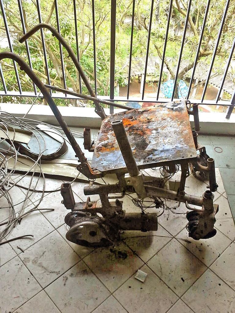 This motorised wheelchair was among items which caught fire along a common corridor at Block 8 in North Bridge Road on Wednesday. SCDF officers rescued national para-archer Alex Lim, who was trapped inside his flat during the blaze.