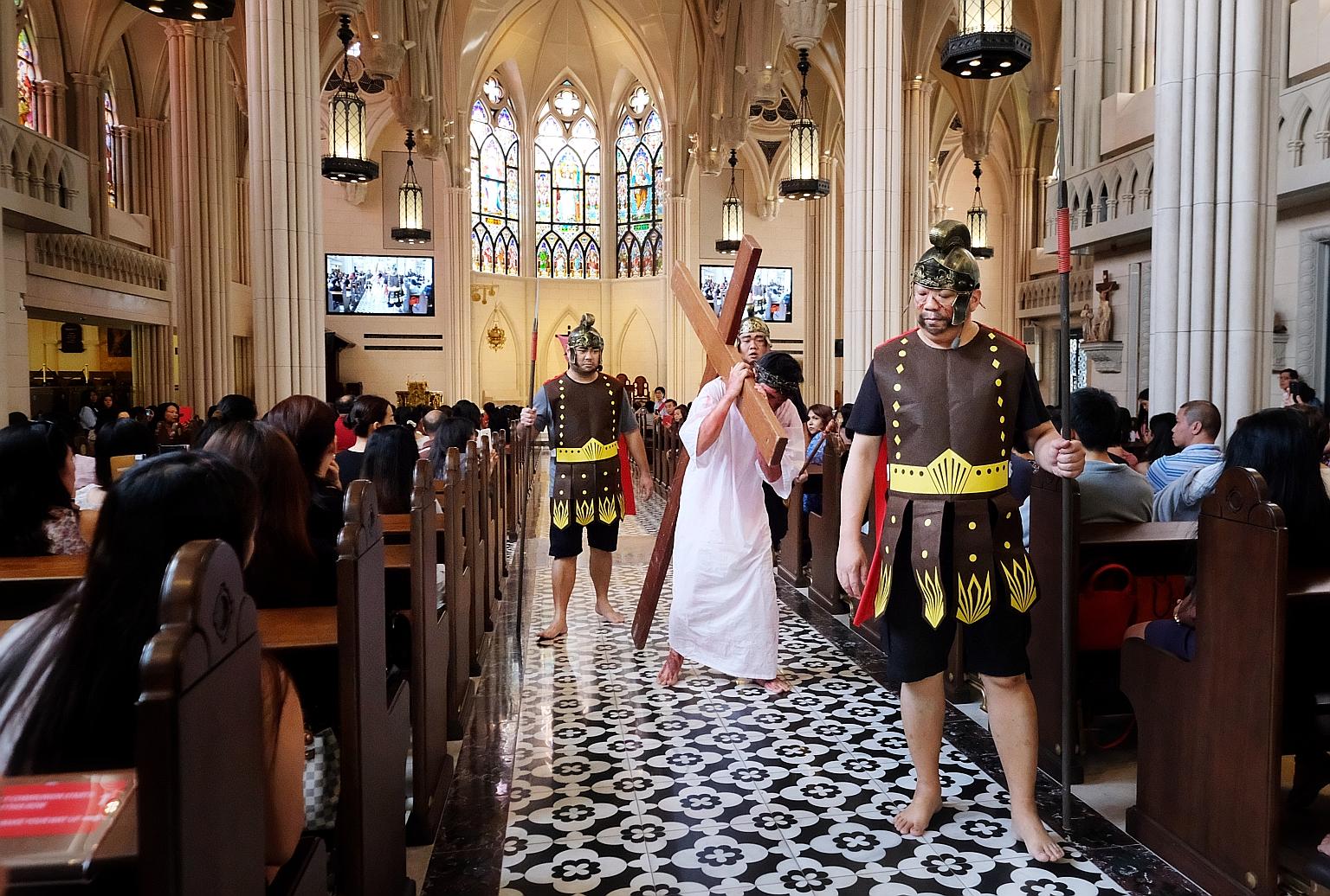 The newly renovated Novena Church in Thomson Road held a Good Friday service yesterday, its first after a three-year, $54 million overhaul. About 1,700 worshippers watched a play depicting Jesus Christ's journey to Calvary, where he was crucified. Th