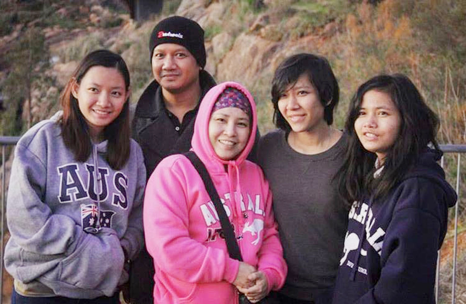 Singaporean Mirkhan Ariffin with his wife Nadine Sulastri (in pink) and their daughters (from left) Shazwani, 24, Sri Lyana, 22, and Sorfinah, 19. The girls are now in Indonesia with their father.
