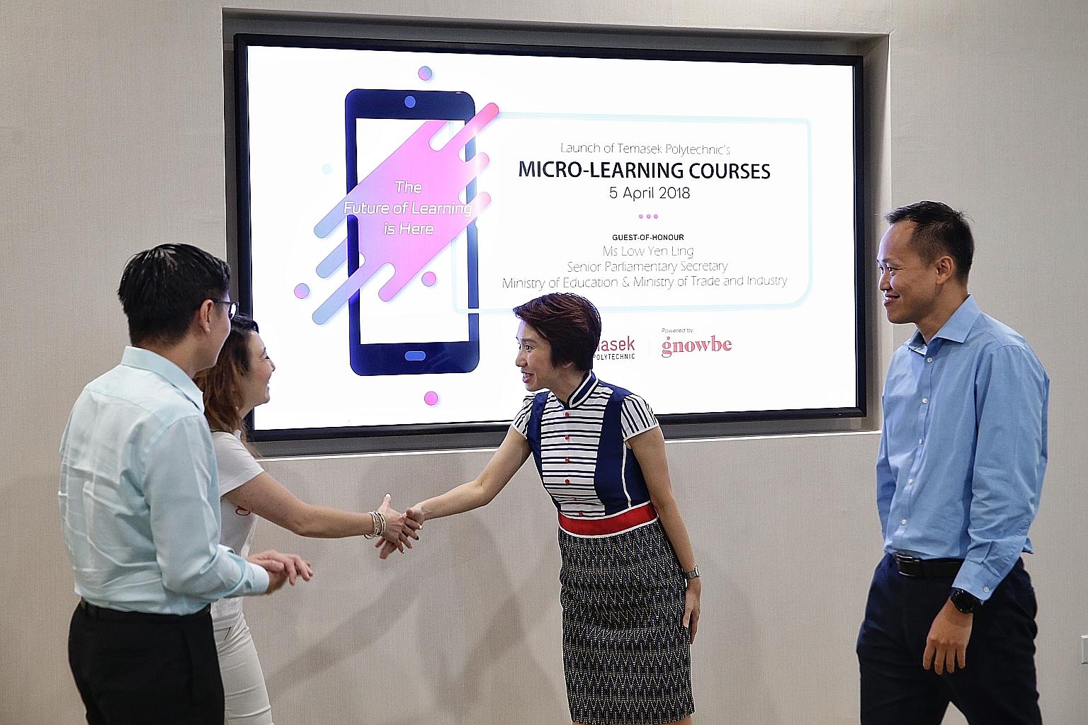 Senior Parliamentary Secretary Low Yen Ling (centre) meeting Gnowbe founder and CEO So-Young Kang at the launch yesterday. With them are SkillsFuture Singapore CEO Ng Cher Pong (far left) and Temasek Polytechnic principal and CEO Peter Lam.