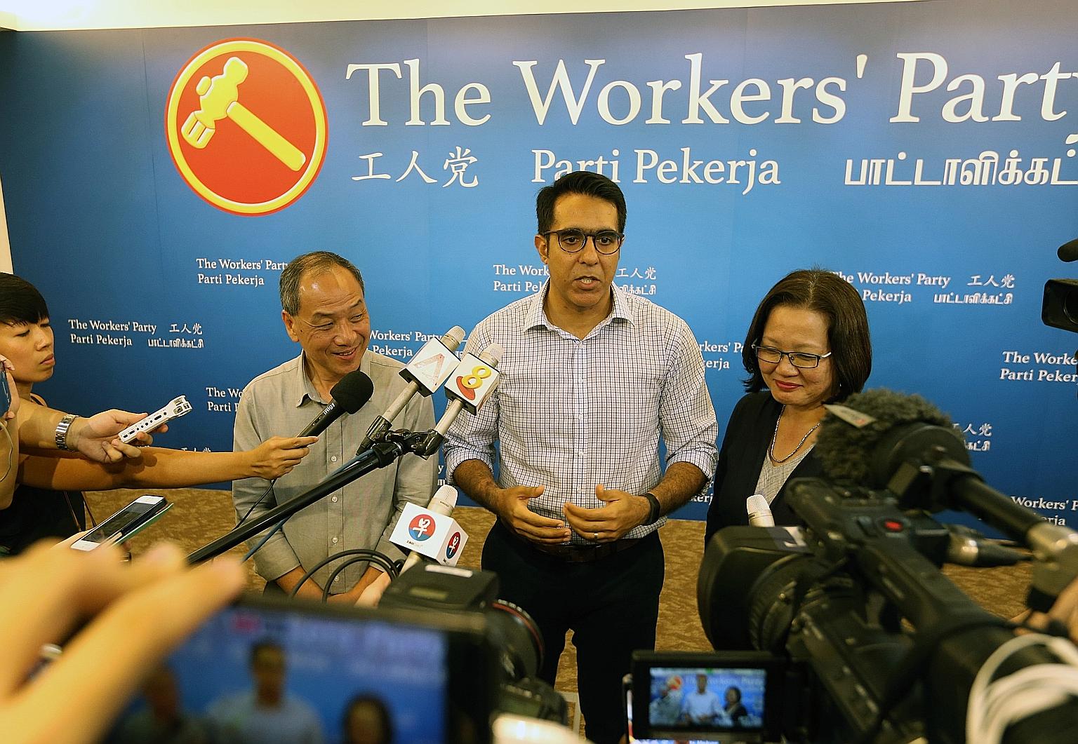 New WP chief Pritam Singh addressing the media yesterday with his predecessor Low Thia Khiang and chairman Sylvia Lim. Mr Singh said his immediate task is to reach out to party members for their views and vision for the party, adding that it was impo