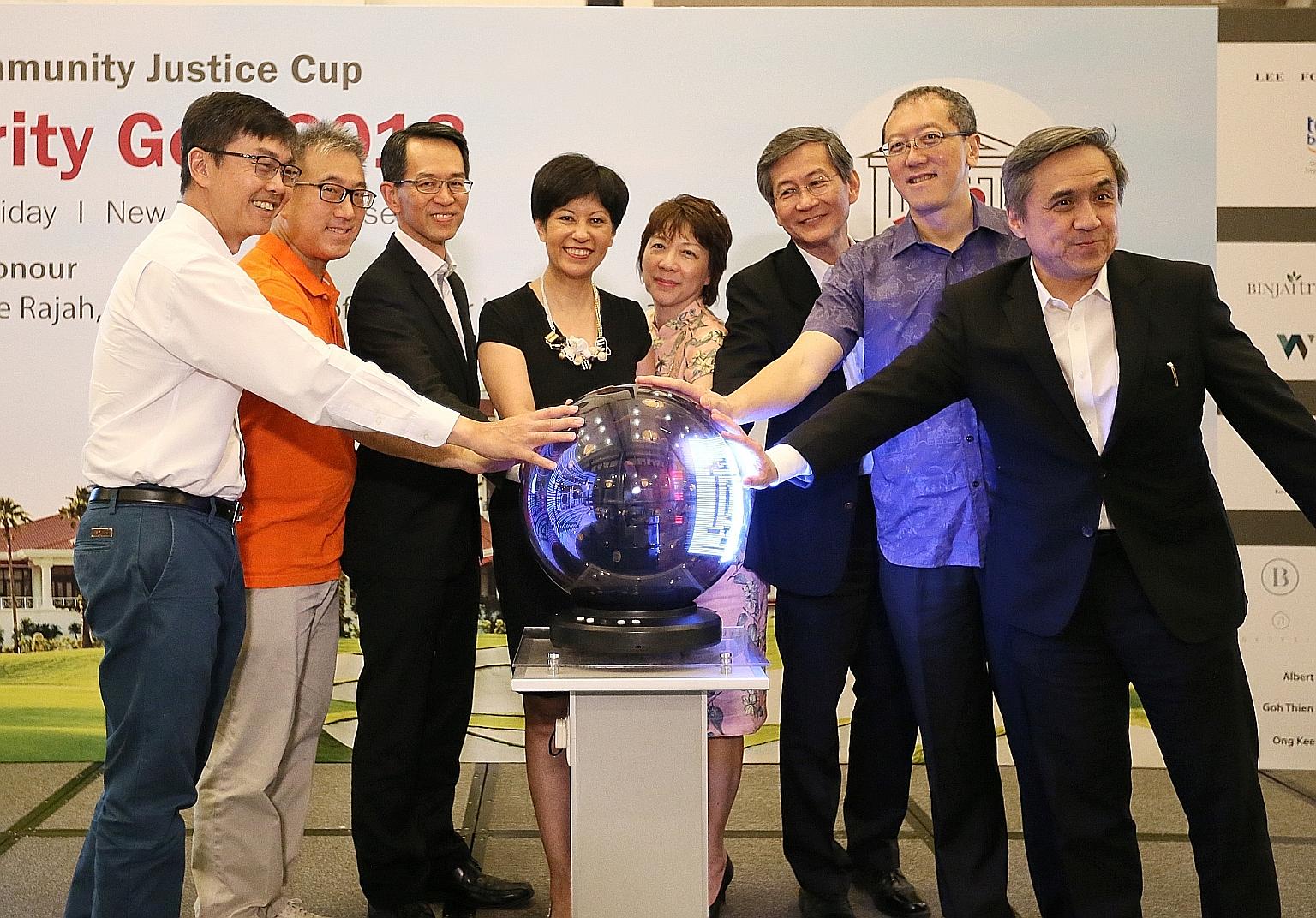 (From Left) National Council of Social Service chief executive Sim Gim Guan, Community Justice Centre vice-chairman Chew Kwee San, Justice See Kee Oon, Senior Minister of State for Finance and Law Indranee Rajah, Justice Debbie Ong, Justice Tan Siong