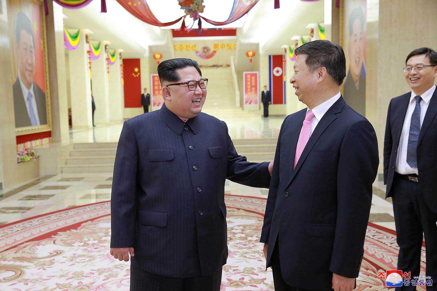 Kim Jong Un greets Chinese official, calls for stronger ties between North  Korea and China | The Straits Times
