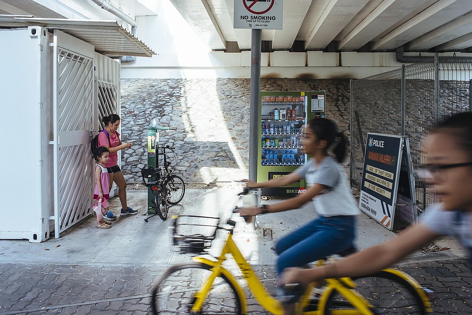 A BikeAid vending machine at the Punggol Waterway Park, located under the Sentul Crescent bridge. Cyclists can buy items such as tyre levers, inner tubes and repair kits, while other park users can buy first-aid kits, ponchos and mosquito patch kits,