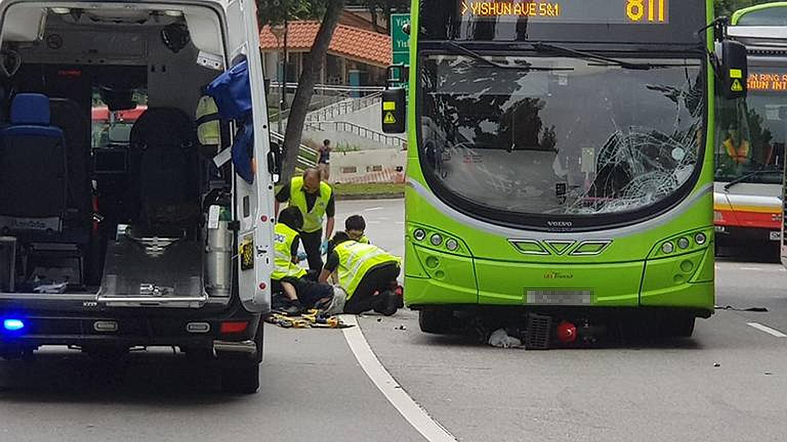The 86-year-old e-scooter rider being attended to at the scene of the accident in Yishun. Police said he was "taken conscious to Khoo Teck Puat Hospital". The Straits Times understands the man had multiple injuries after he was involved in an acciden