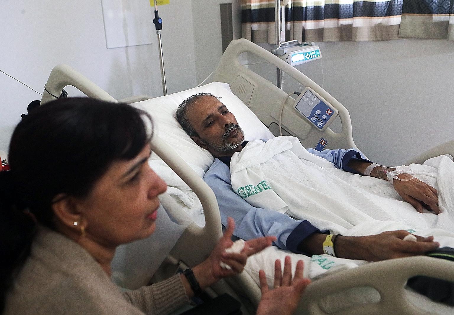 Mr Ajit Singh at a healthier weight before the lung cancer struck. He said workers were given flimsy masks that did not protect them from asbestos. Mr Ajit Singh, who was found to have lung cancer early last year, with his wife Koldip Kaur. The 57-ye