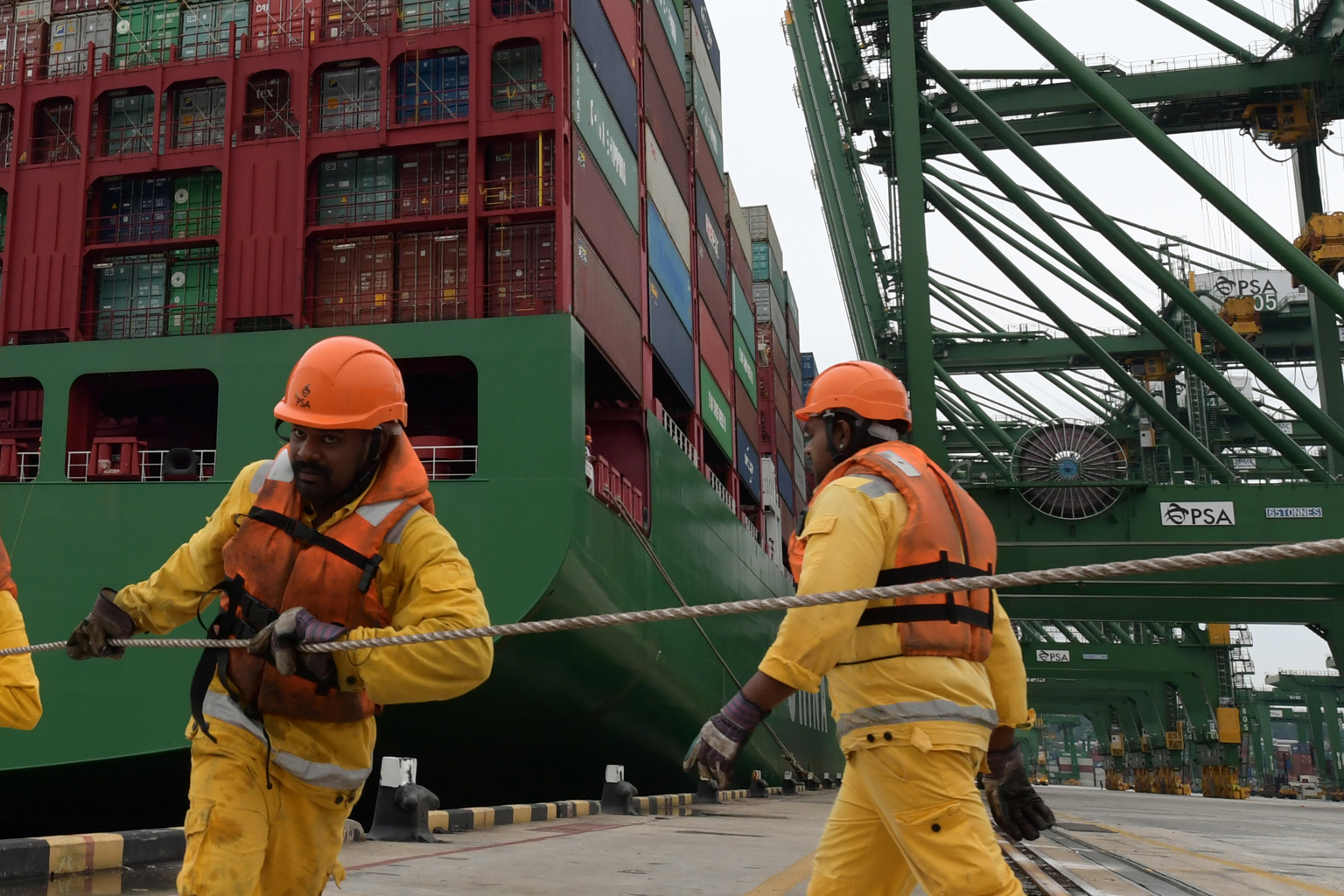 Workers at the Pasir Panjang Terminal. One way of dealing with a potential trade war is to look to South-east Asia for new opportunities.
