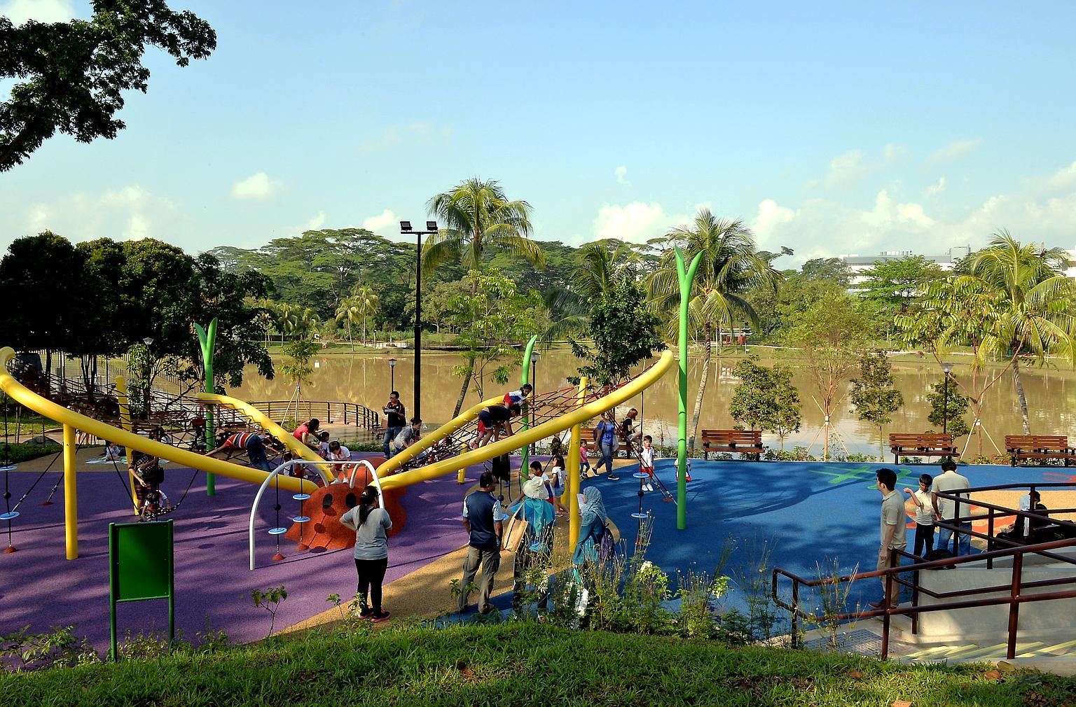 Marsiling Park features improved lighting, new boardwalks and activity spaces such as a fitness corner and a butterfly-shaped rope playground. Popular elements of the park - such as the viewing tower, Chinese pavilions and stone bridge - have been re