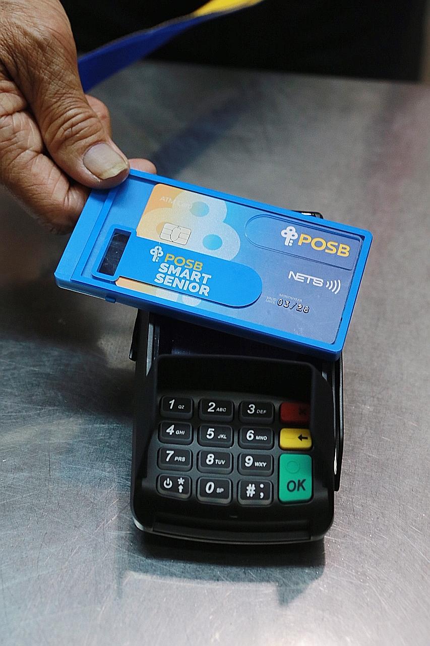 The ATM card doubles up as fare card and is held in a "Smart Sleeve" that tracks steps.