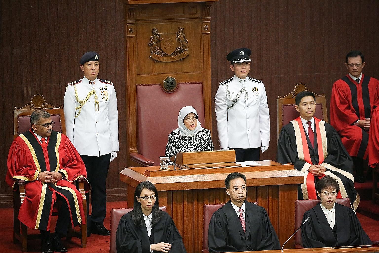 President Halimah Yacob, flanked by Speaker of Parliament Tan Chuan-Jin and Chief Justice Sundaresh Menon, representing the different branches of government, addressed a packed chamber at Parliament House yesterday.
