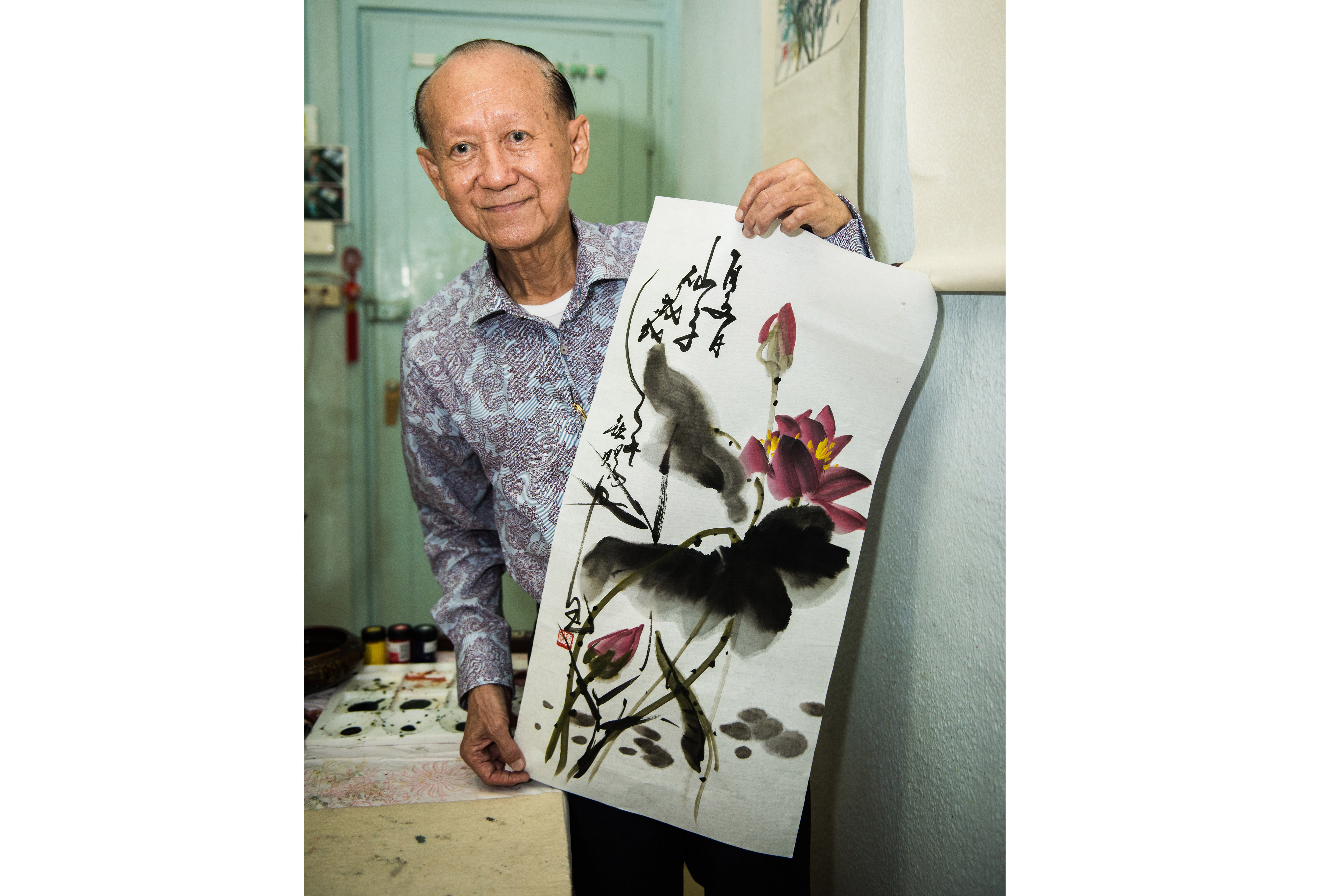 Veteran painter Tan Khim Ser has been teaching painting for 50 years.