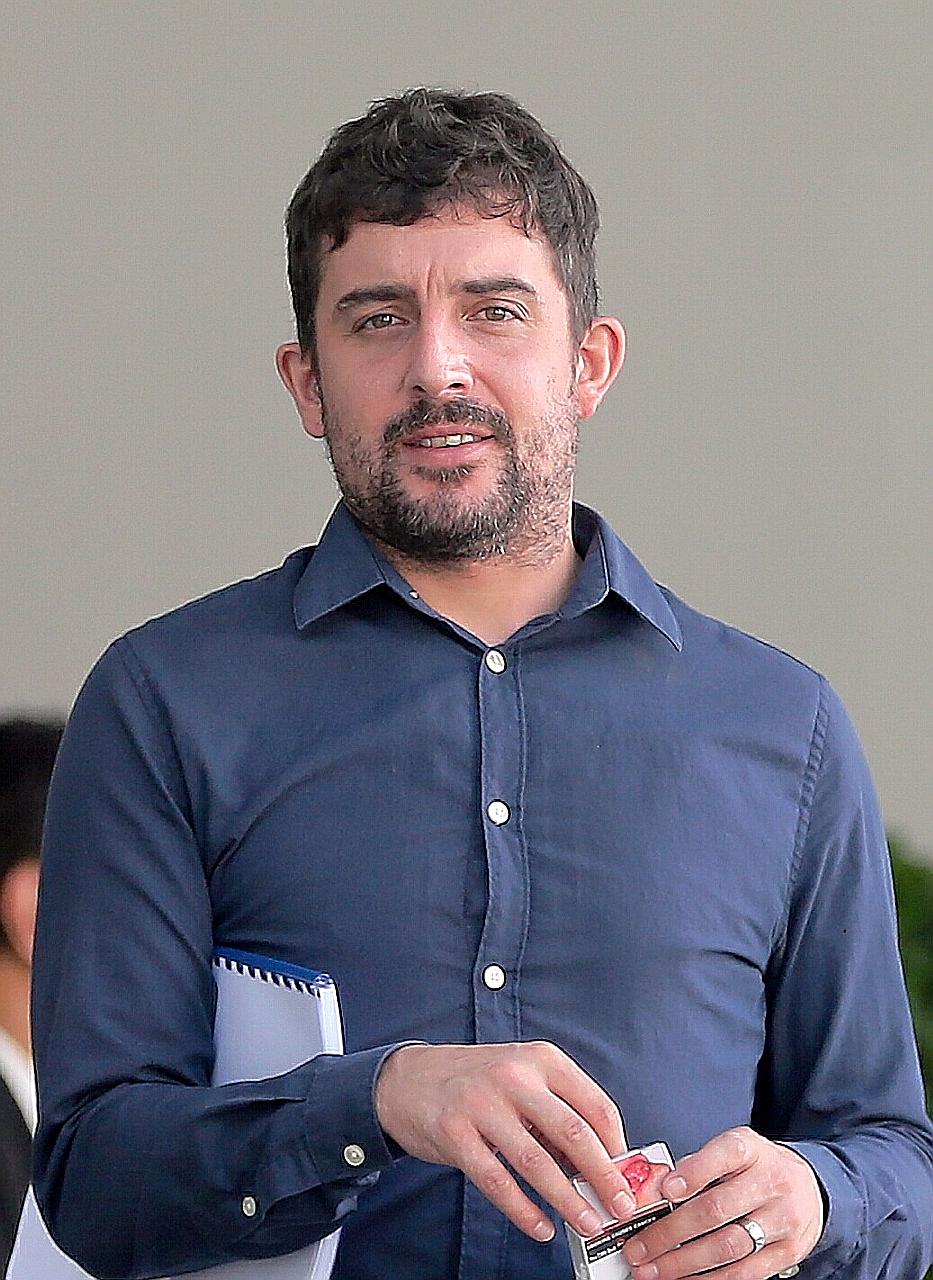 Benjamin John Holman, 34, broke the nose of a man who had bumped into him accidentally at an MRT station.