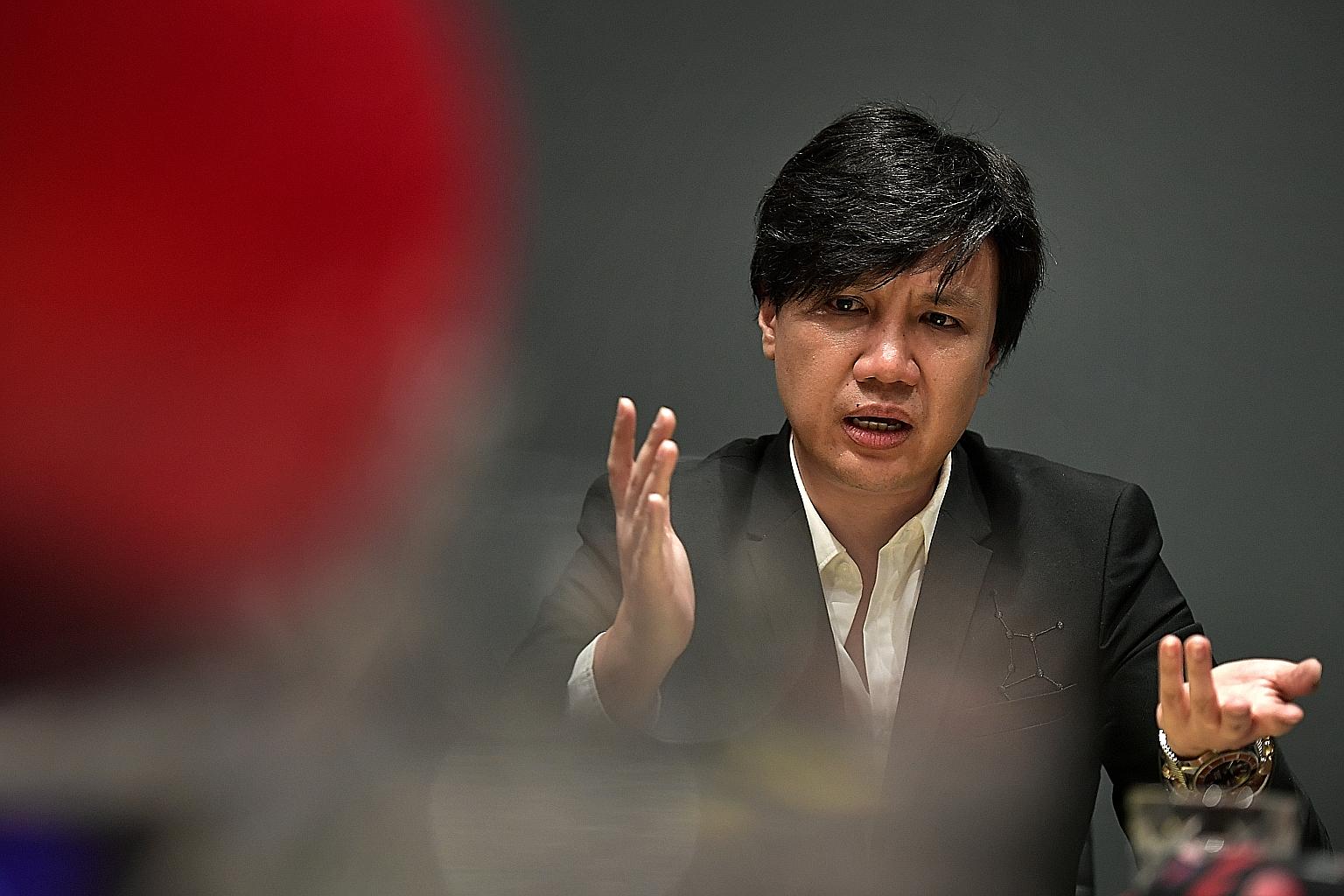 Entertainment lawyer Samuel Seow, 45, who also owns artist management firm Beam Artistes, giving a press conference at his office yesterday, in response to the allegations against him.