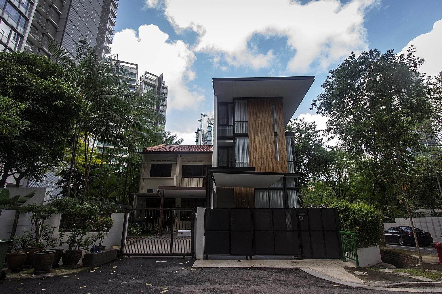 No. 18 Lengkok Angsa (left) is one of the only two original terraced houses left after much of the neighbourhood was redeveloped in recent years.
