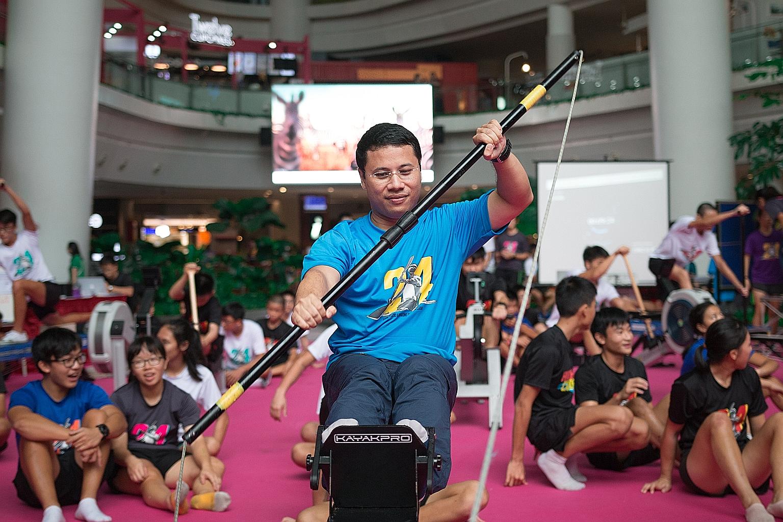 Minister for Social and Family Development Desmond Lee paddling for a good cause yesterday. He was taking part in the 24-hour kayaking challenge organised by Hwa Chong Institution students to raise funds for the Muscular Dystrophy Association, Singap
