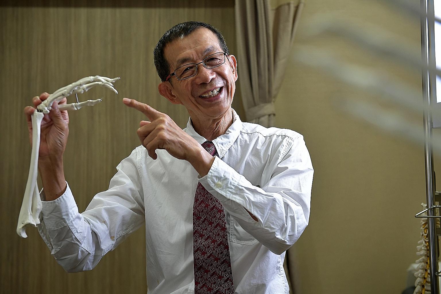 Associate Professor Teoh Lam Chuan's work focuses on restoring the function and appearance of the injured hand.