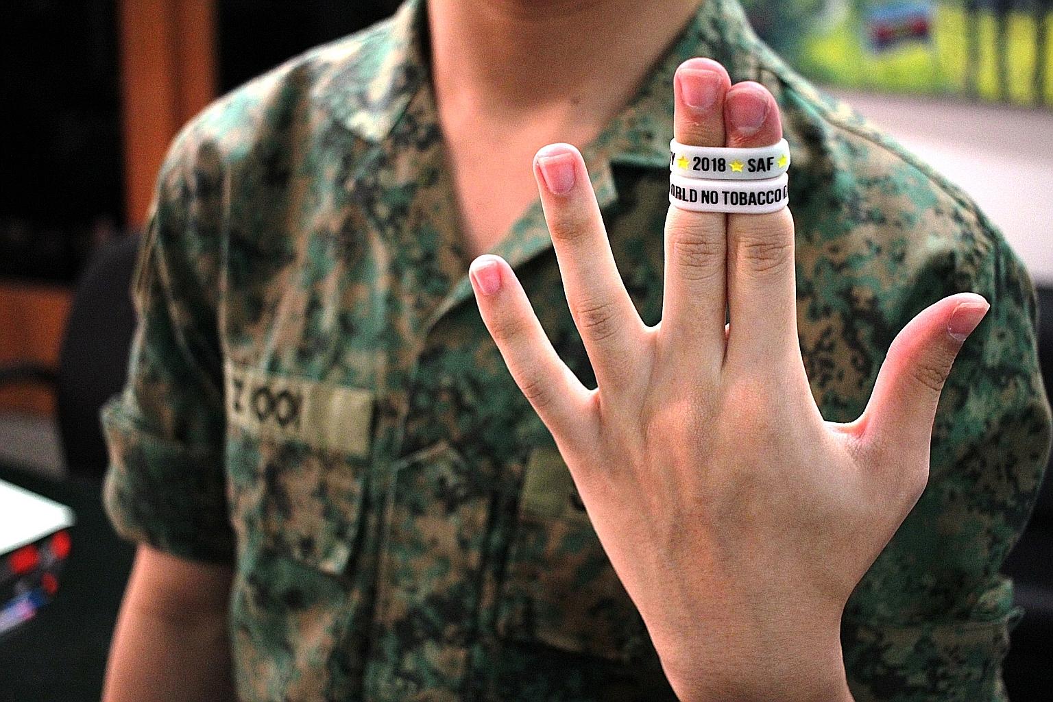 An SAF personnel pledges to abstain from tobacco for 24 hours on World No Tobacco Day. It is part of an initiative under the SAF Smoking Cessation Framework.