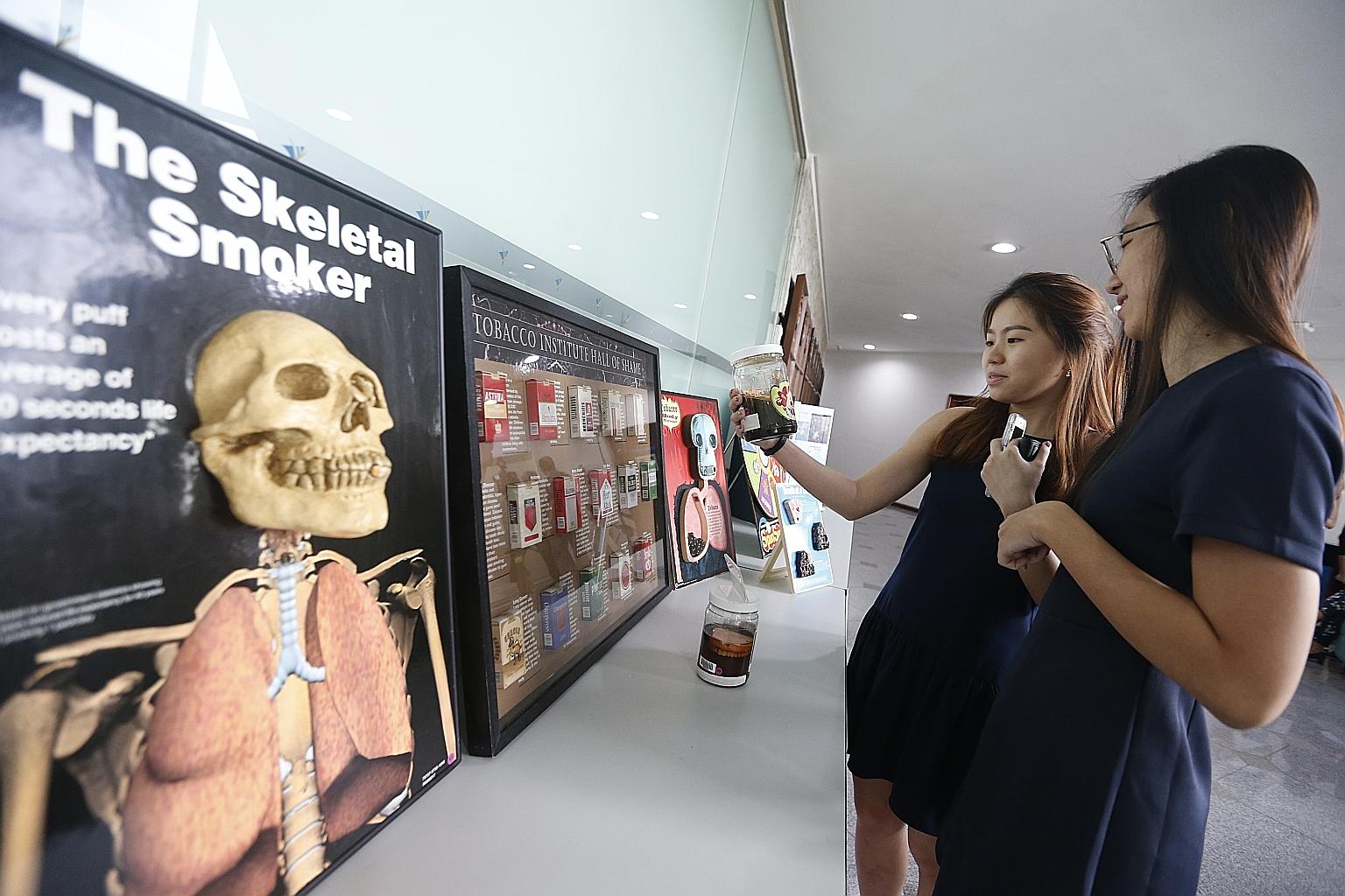 Students visiting the Health Sciences Authority's Cigarette Testing Laboratory yesterday.