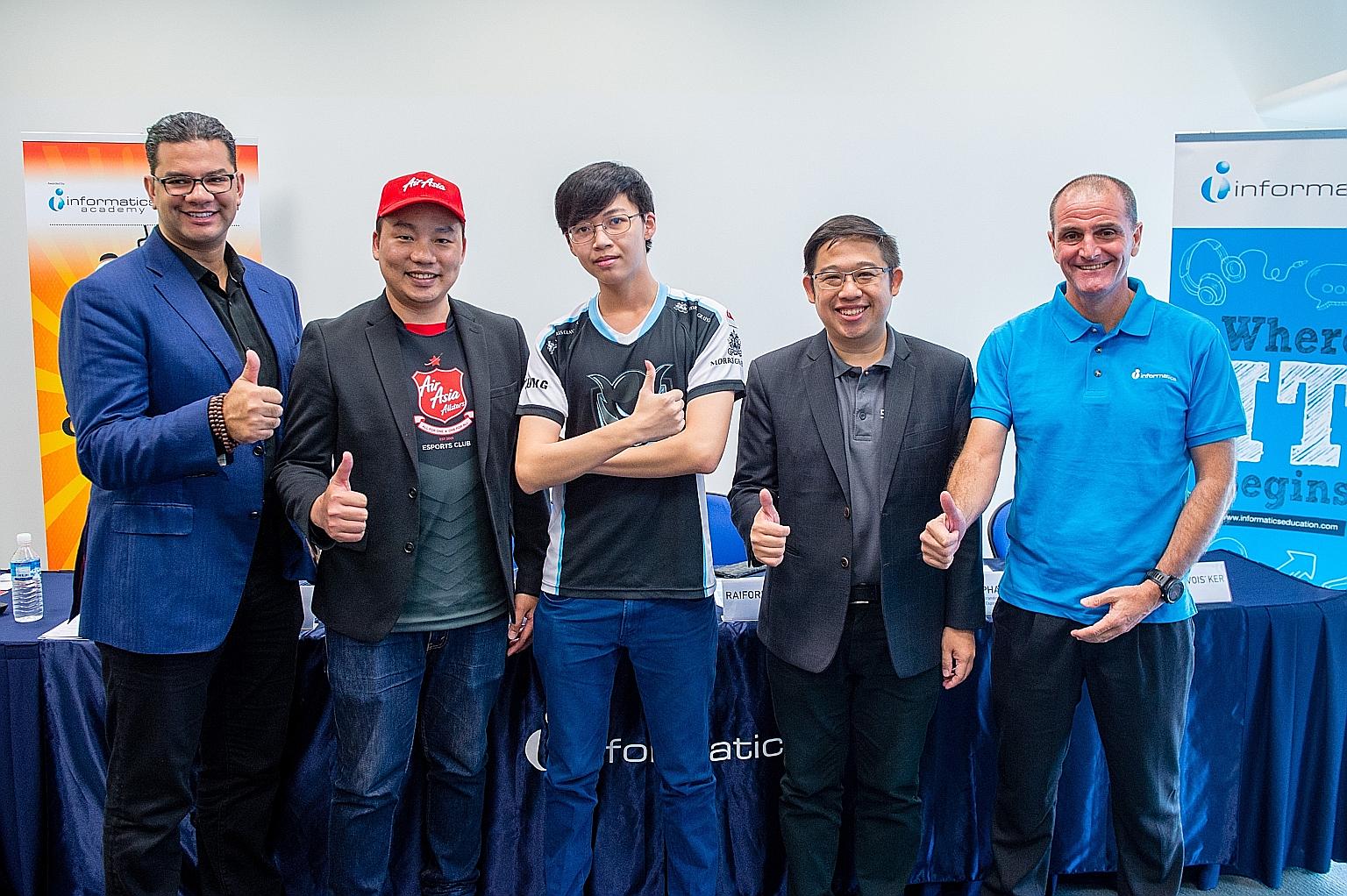 (From left) Digital talent platform Bitrep's chief executive Raiford C. Cockfield III, AirAsia Allstars Esports Club team manager Allan Phang, professional gamer Amos Ker, Singapore Cybersports & Online Gaming Association chairman and co-founder Nich