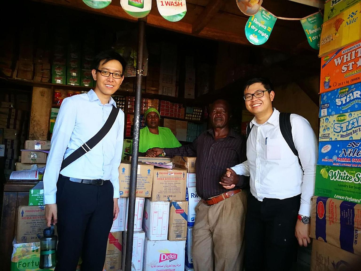 Mr Tan Rui Feng (right) with sellers at a local retailer he visited during his internship stint in Uganda. The Singapore Management University student spent 10 weeks from May last year at a consumer goods firm there.